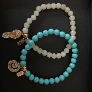 Coach bead bracelets with charms